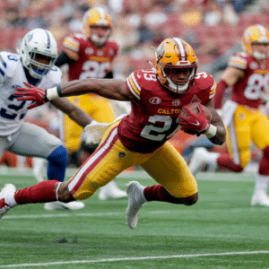 Clyde Edwards-Helaire diving for extra yardage